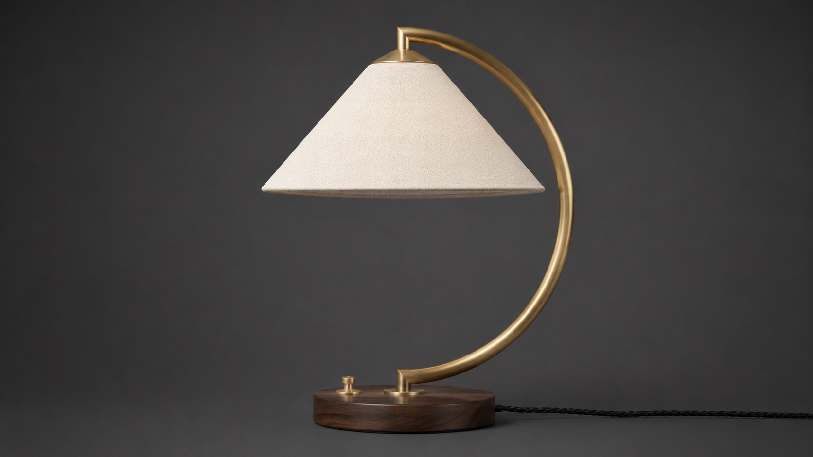 Image 1: front view of the sculptural brass desk lamp